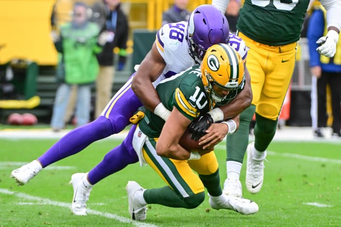 Jordan Love is sacked by Vikings defensive end DJ Wonnum.